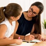 Help with Homework - Adult Helping the Child with Homework