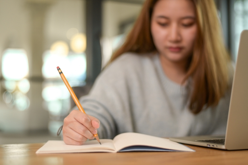 How to Write a Perfect Personal Statement - Student Writing Her Personal Statement