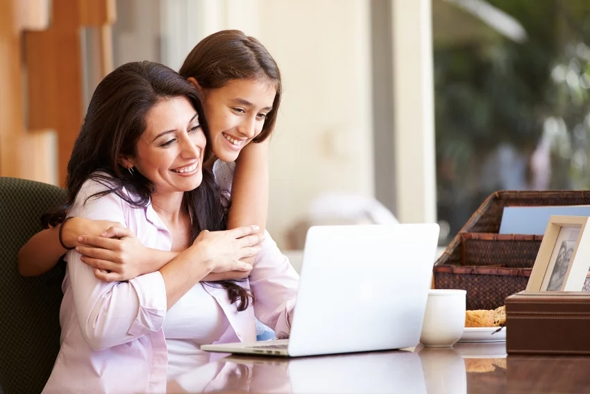GCSE Resutls Day - Mum and the Child Checking the GCSE Results Together